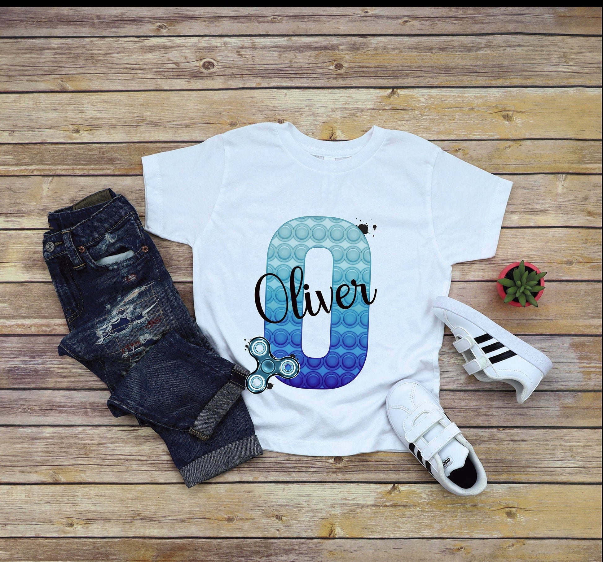 Poppit Cushion Gift, Blue Initial Poppit Fidget Toy Personalised Cushion Gift